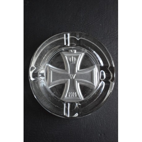 A 100 year old glass ashtray embossed with the Iron Cross.