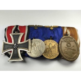 Four Medals Bar WWII with Iron Cross second class maker Otto Schickle one piece, very rare cross.