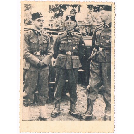 Photo of a soldier Wehrmacht with DKiG, EK2, EK-1, a badge for an armored assault, wounds badge.