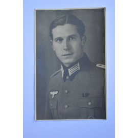 Photo of a soldier Wehrmacht with wound badge and ribbon bar east medal.