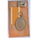 A West Wall Campaign Medal with ribbon and enwelope maker Karl Hensler, Pforzheim.