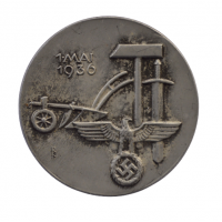 A 1936 National Day of Labour Badge maker marked.