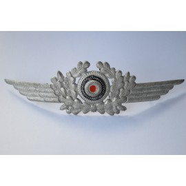 A Luftwaffe Nco’s Visor Cap Wreath And Cockade Insignia