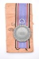 A Air Raid Defence “Luftschutz” Medal Scond Class marked 60 maker Katz & Deyhle in bag.