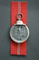 A 1941 - 42 EAST MEDAL UNMARKED.