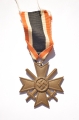 Set badges Iron Cross, War Merit Cross with swords and ribbon bar.