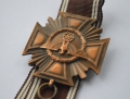 An NSDAP Long Service Award, 10 Year Service Cross marked 14 maker  L. Christian Lauer Nürnberg