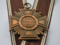 An NSDAP Long Service Award, 10 Year Service Cross marked 14 maker  L. Christian Lauer Nürnberg