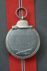 A 1941 - 42 EAST MEDAL UNMARKED.