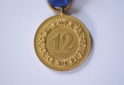 A SECOND WAR GERMAN ARMY LONG SERVICE MEDAL - 12 YEARS.
