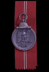 A 1941 - 42 EAST MEDAL MARKED 110 BY maker Otto Zappe, Gablonz.