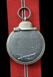 A 1941 - 42 EAST MEDAL UNMARKED.