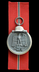 A 1941 - 42 EAST MEDAL UNMARKED.