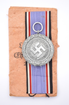 A Air Raid Defence “Luftschutz” Medal Scond Class marked 60 maker Katz & Deyhle in bag.