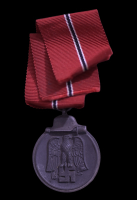 A 1941 - 42 EAST MEDAL MARKED 7 BY maker Paul Meybauer, Berlin.
