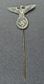 An NSDAP eagle stickpin marked GES.GESCH.