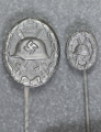 Set Wound Badge Black stickpins, one marked L/18 