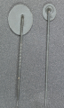 Set Wound Badge Black stickpins, one marked L/18 