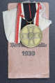 A War Merit Medal In Its Original Paper Packet Of Issue By Gottlieb Keck & Sohn, Pforzheim.