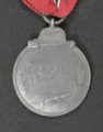 A 1941 - 42 EAST MEDAL UNMARKED.