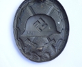 Black Wound Badge marked L/11 maker Wilhelm Deumer, Lüdenscheid.