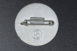 A 1936 National Day of Labour Badge maker marked.