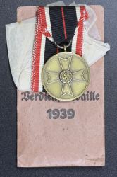A War Merit Medal In Its Original Paper Packet Of Issue By Gottlieb Keck & Sohn, Pforzheim.