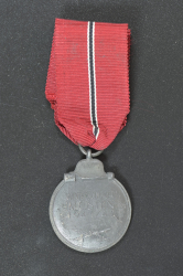 A 1941 - 42 EAST MEDAL UNMARKED.